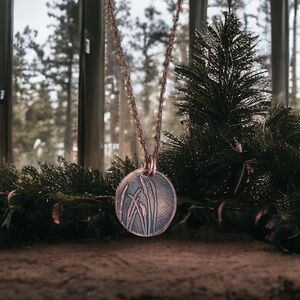 Artisan made. One of a kind etched copper necklace.